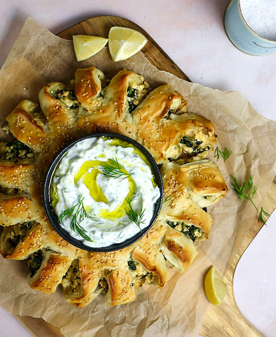 Spanakopita wreath with tzatziki