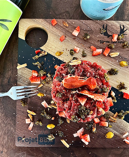 Steak tartare with strawberries, almonds, and prosciutto by Alex Turcotte