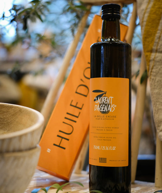 750 ml Olive Oil by Laurent Dagenais and La Belle Excuse, a triple-blend olive oil made from Agorelio, Mavrolia, and Koroneïki olives.
