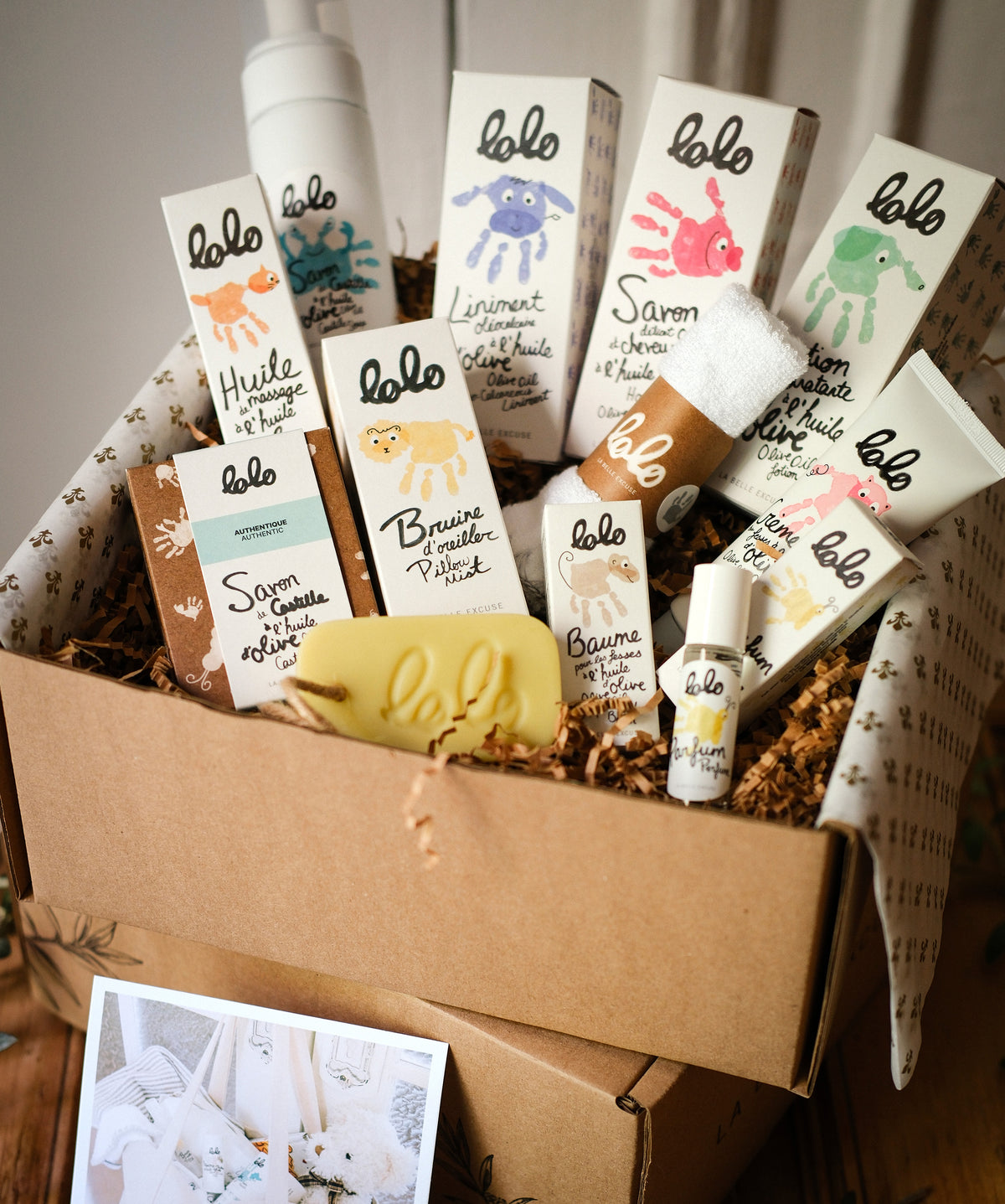 LOLO Starter Kit featuring perfume, washcloth, diaper care products, gentle hair and body wash, lotion, Castile soaps, pillow mist, and massage oil.