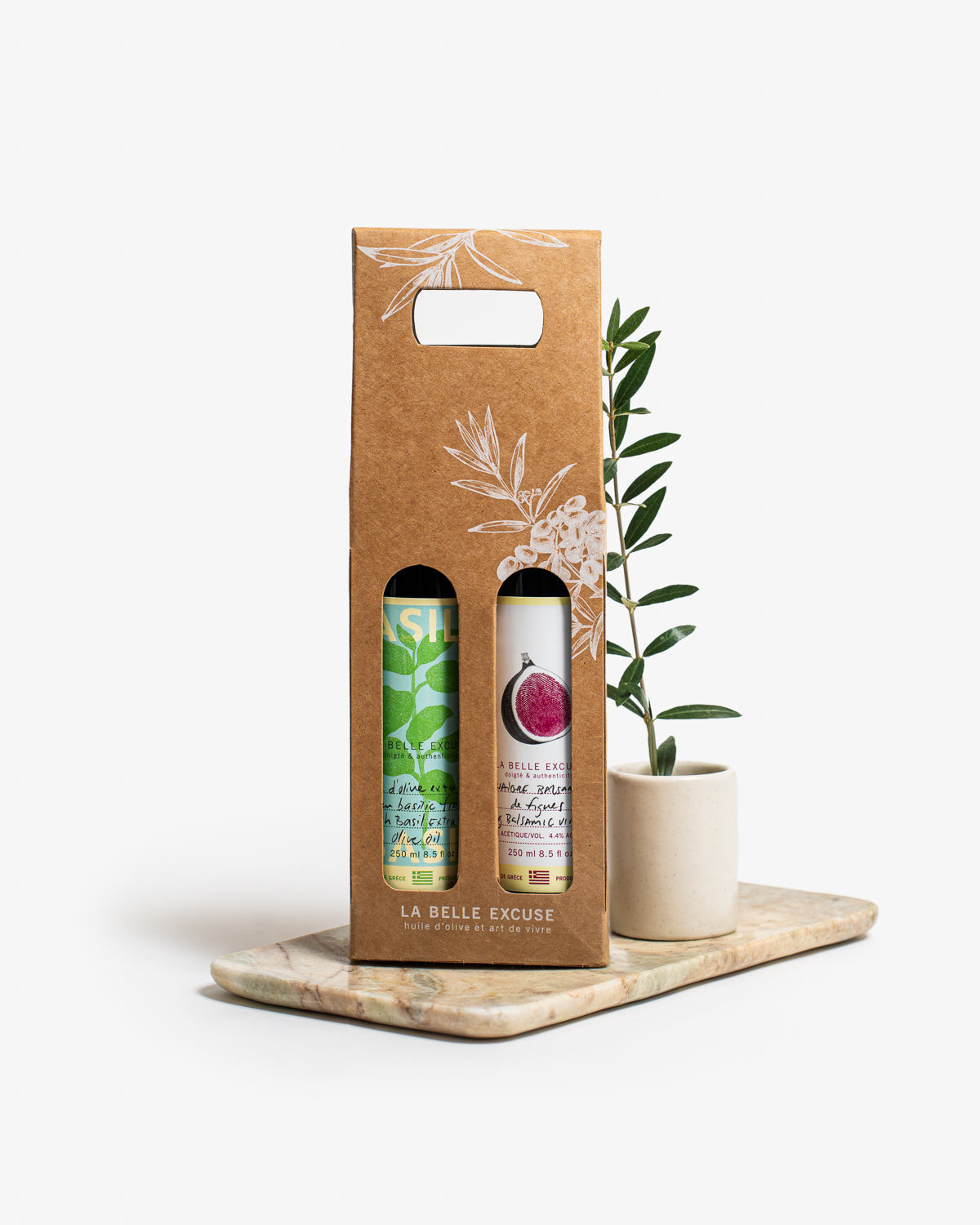 La Belle Excuse Olive Oil and Balsamic Vinegar Gift Box featuring a 250 ml bottle of green or black olive oil paired with a balsamic vinegar.